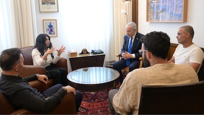 Israeli Prime Minister Benjamin Netanyahu meets with Yaniv Hayoun, Or Fradilov, Dr. Shota Musayev and his wife, Sigalit, who he described as 'heroes', who intervened to prevent a disaster on a flydubai aircraft bound for Israel from the United Arab Emirates, which was diverted to Saudi Arabia following an emergency signal, in Jerusalem, October 1, 2026. Image/Israel Government Press Office