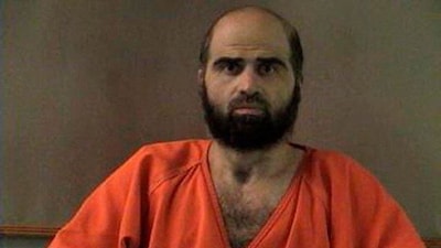 Nidal Hasan, charged with killing 13 people and wounding 31 in a November 2009 shooting spree at Fort Hood, is pictured in an undated handout photo obtained by Reuters on June 29, 2012. Image/Bell County Sheriff's Office