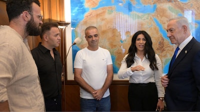 Israeli Prime Minister Benjamin Netanyahu meets with Yaniv Hayoun, Or Fradilov, Dr Shota Musayev and his wife, Sigalit, who he described as "heroes," who intervened to prevent a disaster on a flydubai aircraft bound for Israel from the United Arab Emirates, in Jerusalem, October 1, 2026. File Image/Israel Government Press Offfice