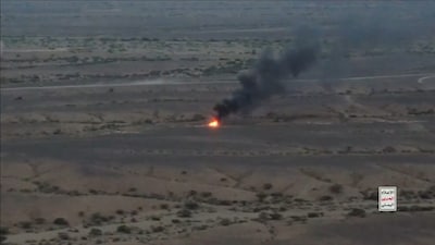 Fire burning in the distance following a drone strike against Saudi-backed Yemeni government forces. Image- AFP