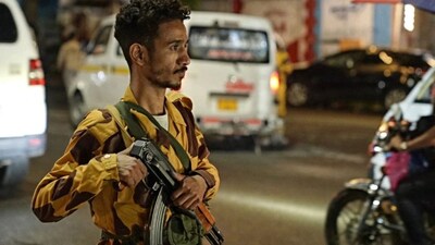 A member of the security forces of the internationally-recognised Yemeni government mans a checkpoint on a street in Taiz amid concerns over Houthi infiltration, late on September 27, 2026. Image- AFP