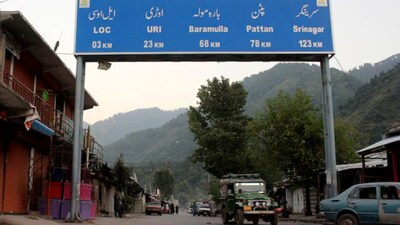 A general view of mileage sign on a road leading to the Line of Control (LoC) in Chakothi, Kashmir, September 9, 2019.- Reuters 