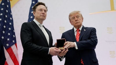 US President Donald Trump presents the National Medal of Science to Tesla and SpaceX CEO Elon Musk during the "A New Golden Age" summit at the US Institute of Peace, renamed The Donald J Trump Institute of Peace by the Trump administration, in Washington, DC, US, October 8, 2026. File Image/Reuters