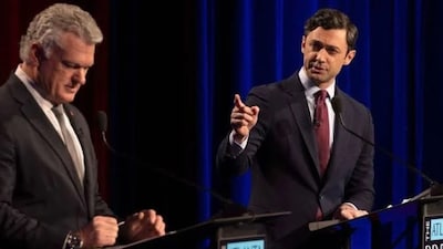  Sen. Jon Ossoff (D-Ga.) and Rep. Mike Collins (R-Ga.), the Republican Senate challenger, debate in Atlanta last night (Photo: Reuters) 
