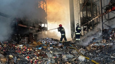 Firefighters work at the site of a warehouse destroyed in a Russian drone strike in the Kyiv region, Ukraine, amid Russia’s ongoing war against the country (Photo: Reuters)