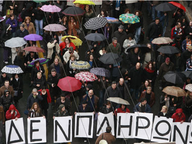 Firstpost on Business: Greece downgraded to 'junk' status Firstpost on Business: Greece downgraded to 'junk' status