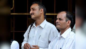 Banks under pressure on rate hike; markets volatile