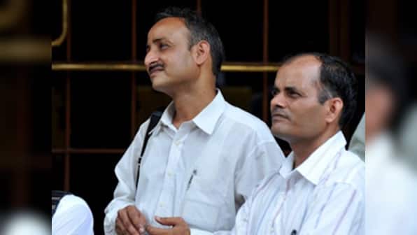 Banks under pressure on rate hike; markets volatile