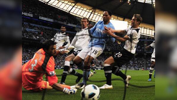Crouch own goal gives City tilt at Champions League