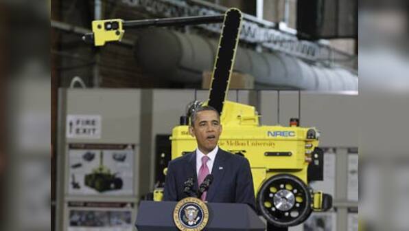 Obama: 'We will thrive again' and robots will take us there