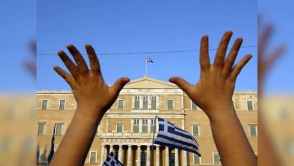 Greece wins vote of confidence for deeper austerity measures