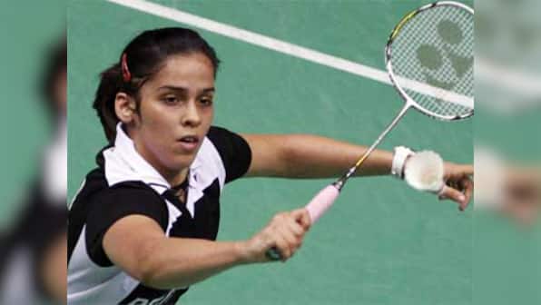 Saina tames former world champ to storm into pre-quarters