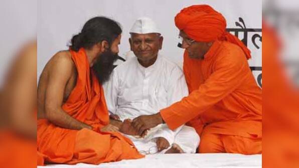 Ramdev vs Hazare: The politics of saffron and white