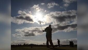 Clarke leads Open as Fowler sparks American charge