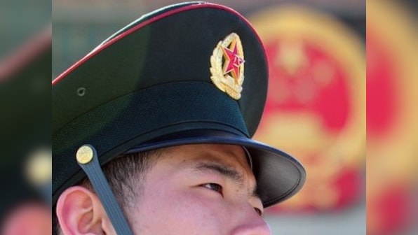 Unrest in China's 'Wild West' still haunts army, leaders  