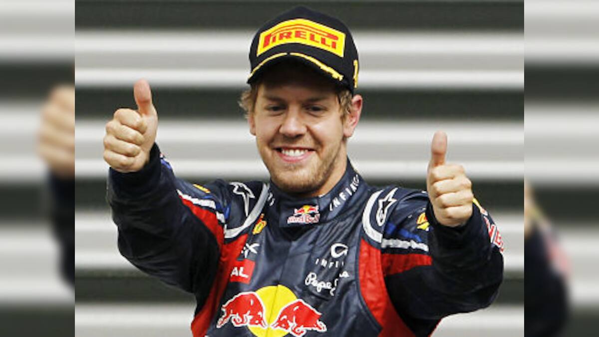Unstoppable Vettel cruises to seventh win – Firstpost