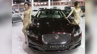 Tata Motors input costs surge, net falls short of estimate