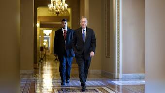 US Congress averts default, downgrade fears loom