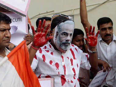 Why Modi worries Congress and some NGOs, but not Anna Why Modi worries Congress and some NGOs, but not Anna