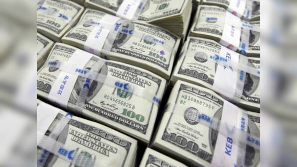 Dollar gets its bang back, pushes rupee down to 1-yr low