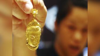 Dollar can't defy gravity, gold is getting its shine back