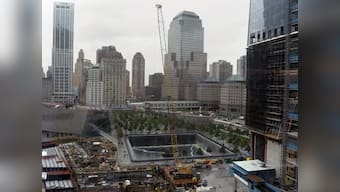 NY takes curtain off 9/11 flag, a tribute to human resilience