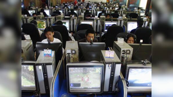 China shuts 50 microblogs citing porn, vulgarity