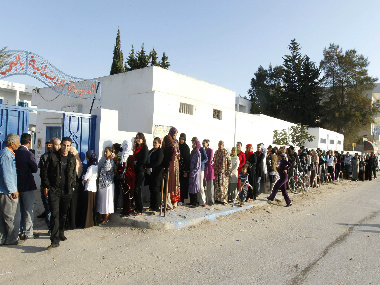 Tunisians begin voting in first "Arab Spring" vote Tunisians begin voting in first "Arab Spring" vote