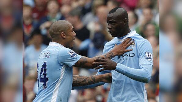 Free-scoring Man City take top spot from United