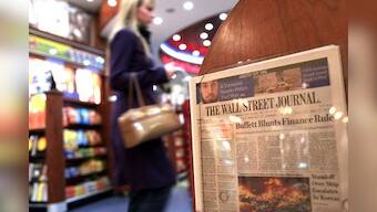 Top Murdoch aide quits over circulation scam in WSJ
