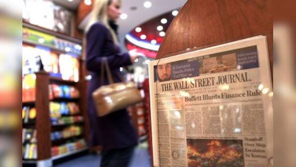 Top Murdoch aide quits over circulation scam in WSJ