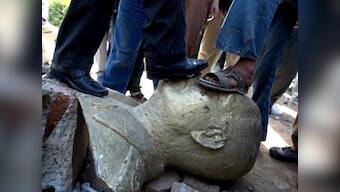 Saddam's bronze buttock up for auction in Britain