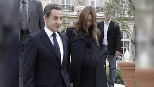 It's a baby girl! but Sarkozy misses the action