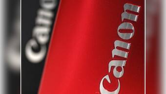 Canon Inc posts quarterly profit, floods to affect year-end sales
