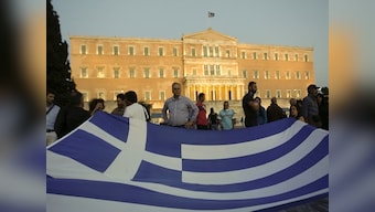 Here comes the hard part: Greek workers on purge list