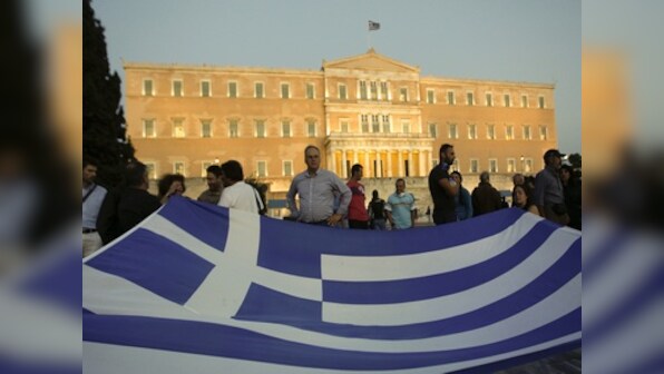 Here comes the hard part: Greek workers on purge list