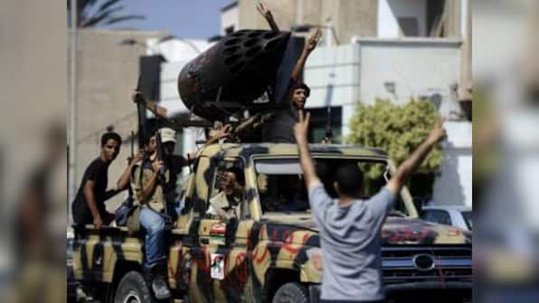 Gaddafi caught like 'rat' in a drain, humiliated and shot