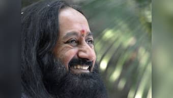 Sri Sri vows to fight corruption after Digvijay's warning