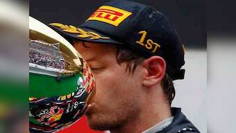 Vettel dedicates win to Wheldon, Simoncelli