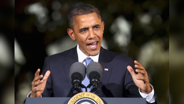 Obama talks tough, says China is too "grown up" to flout rules