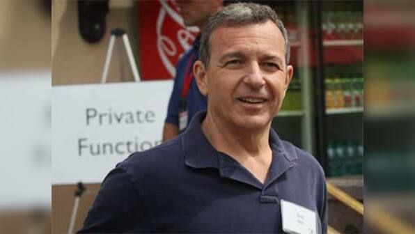 Disney CEO Iger joins Apple, Levinson to replace Jobs