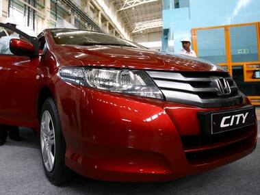 Honda unveils new 'City' sedan; to hit Indian roads by Jan 2014