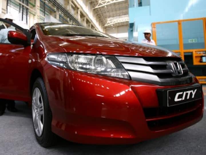 Honda unveils new 'City' sedan; to hit Indian roads by Jan 2014 Honda unveils new 'City' sedan; to hit Indian roads by Jan 2014