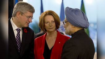 Singh, Gillard meet in Bali; discuss uranium sale issue