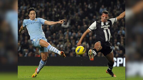 Man City power on with victory over Newcastle