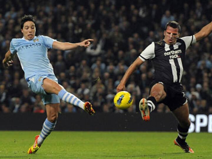 Man City power on with victory over Newcastle