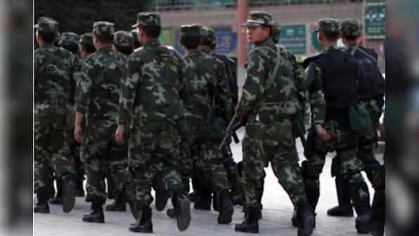 China rushes thousands of police to restive Xinjiang