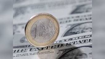 Euro surges on hopes of IMF aid to Italy, outlook still uncertain