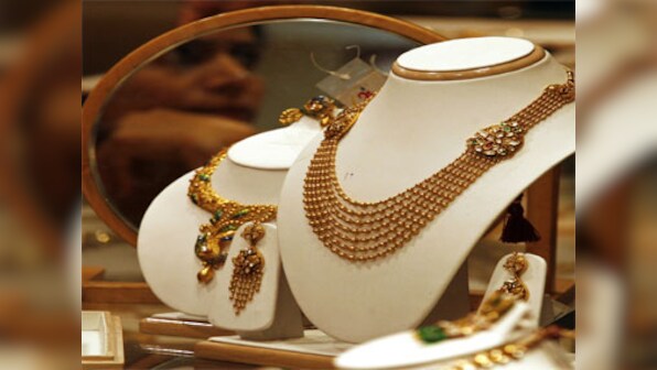 Marriage season spikes gold prices, silver falls on sluggish demand