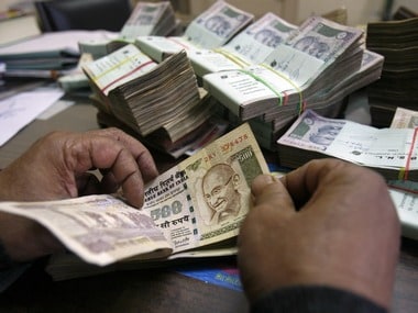 Rupee gains paise against US dollar in opening trade-Business News ,  Firstpost